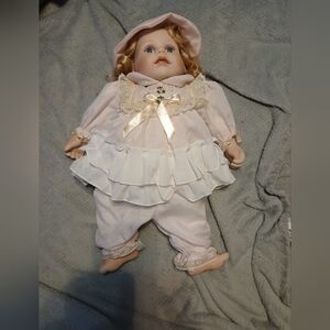 Elegant Pink and White Doll with Lace Details
